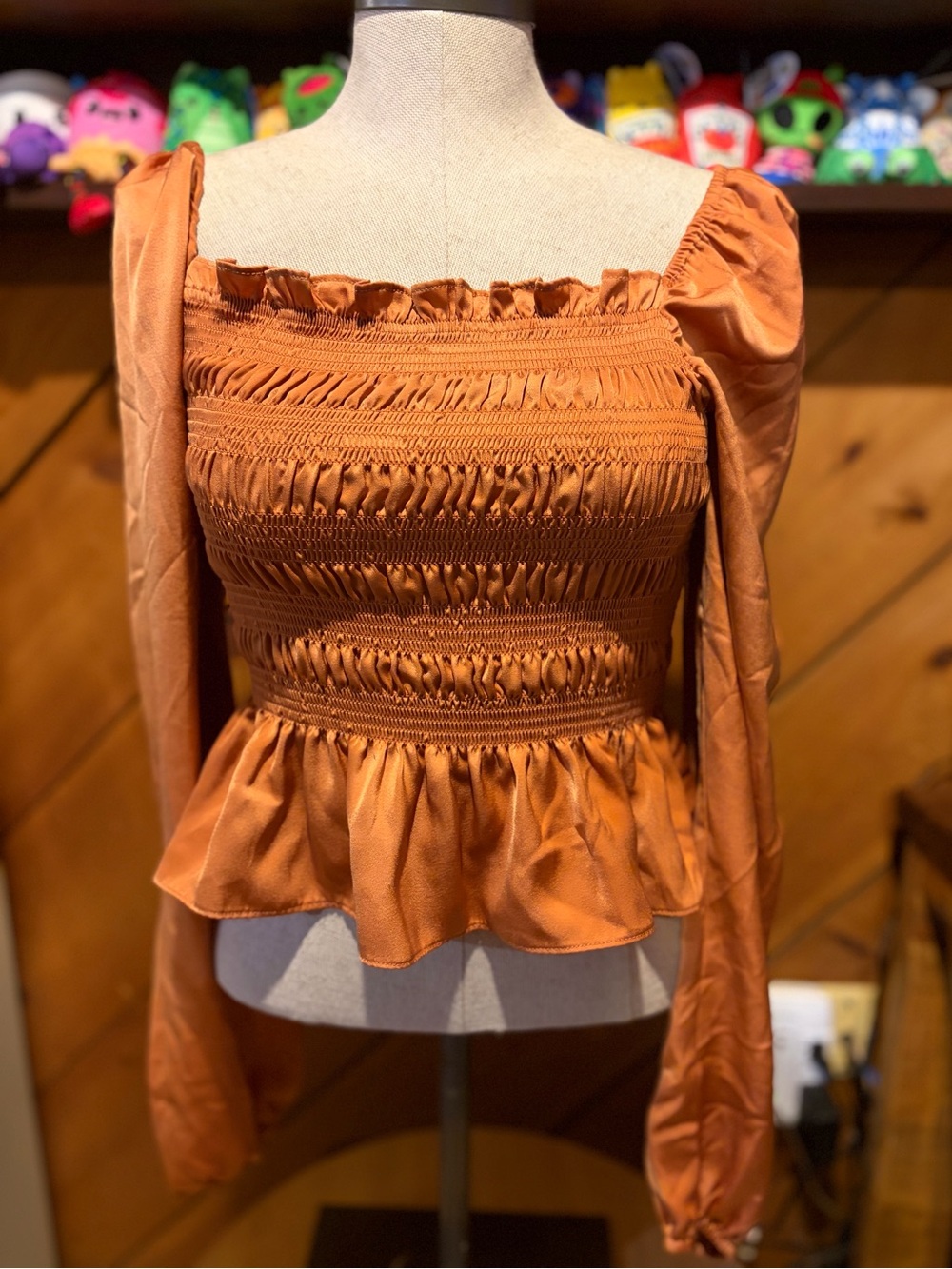 Rust Smocked Peplum Long-Sleeve Blouse